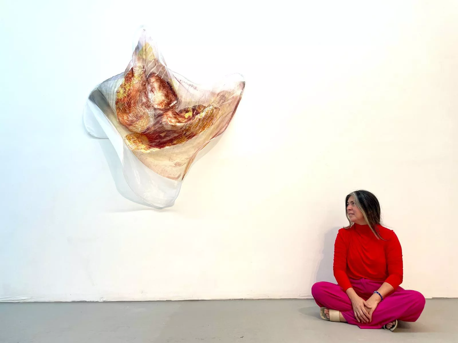 Vega at her solo exhibition in Wynwood's Edge Zones Contemporary Art gallery. Photo by ArtSeen365/@artseen365.